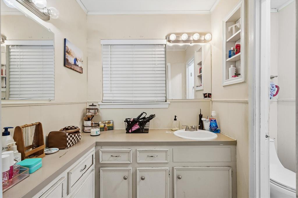 700 Amy Street Canton, TX 75103 - Photo 20 of 35 a bathroom with a sink and a mirror