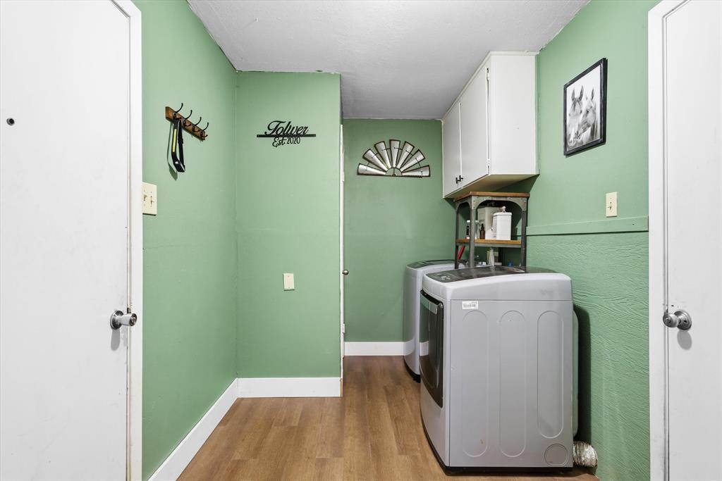 700 Amy Street Canton, TX 75103 - Photo 27 of 35 a room with a washer and dryer