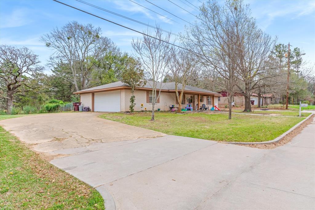 700 Amy Street Canton, TX 75103 - Photo 4 of 35 a view of house with outdoor space and trees
