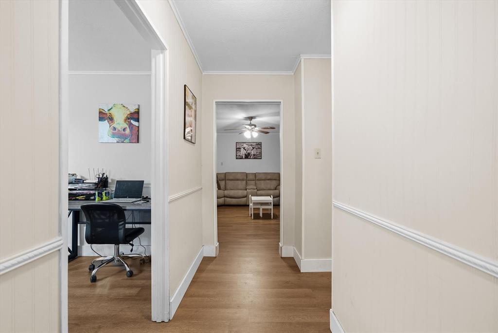 700 Amy Street Canton, TX 75103 - Photo 8 of 35 a view of a hallway with workspace and a window