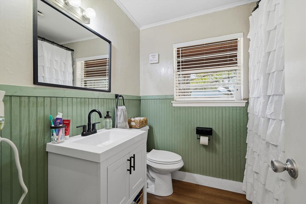 700 Amy Street Canton, TX 75103 - Photo 10 of 35 a bathroom with a sink toilet and a mirror