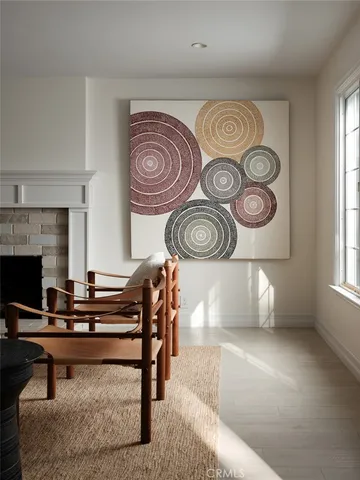 a living room with a couch and a fireplace