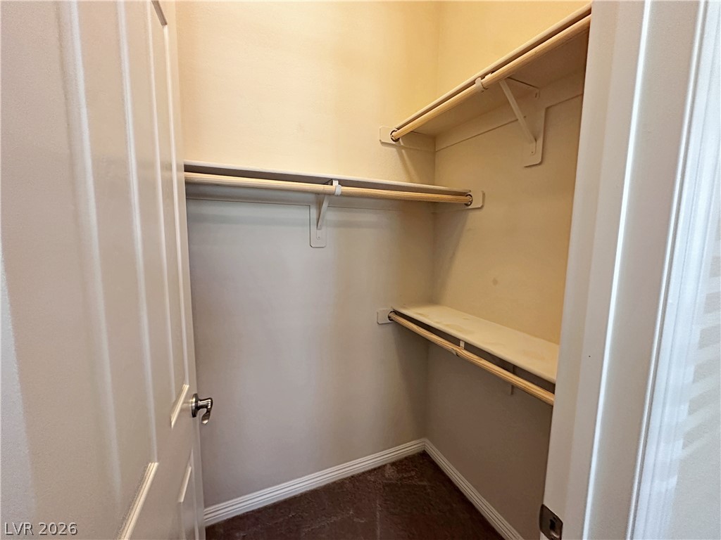 71 Newton Ridge Way Las Vegas, NV 89183 - Photo 21 of 40 Ample storage solutions define this practical, well-appointed closet.