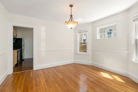 a view of livingroom with hardwood floor and window