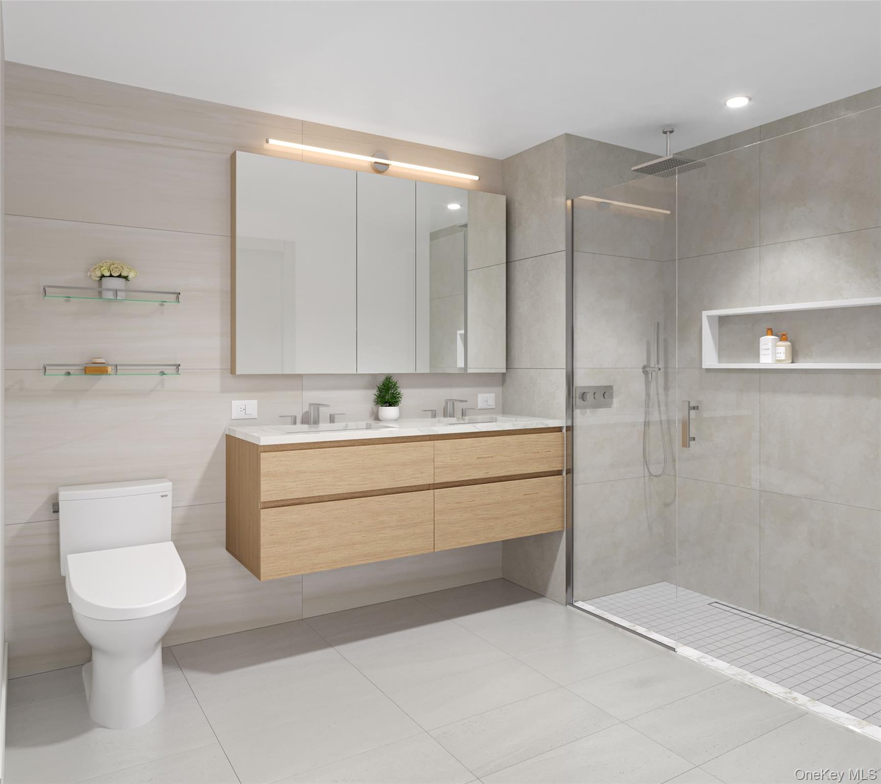 138-18 Northern Boulevard, Unit 10G Queens, NY 11354 - Photo 2 of 11 a bathroom with a sink a toilet and a mirror