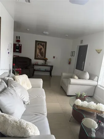 a living room with furniture and a couch