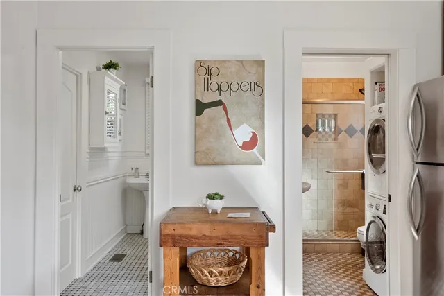 a bathroom with a tub and a shower