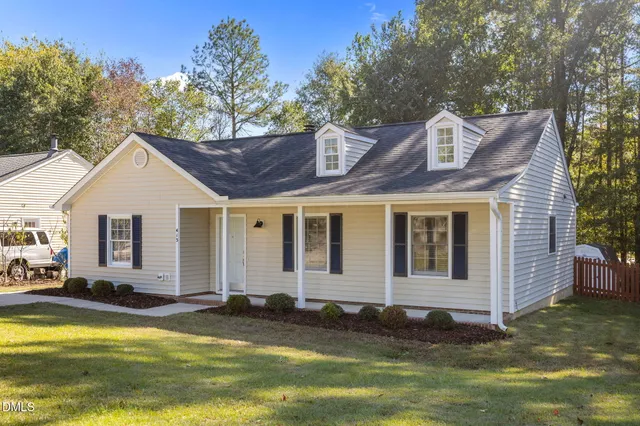 a view of a house with a swimming pool