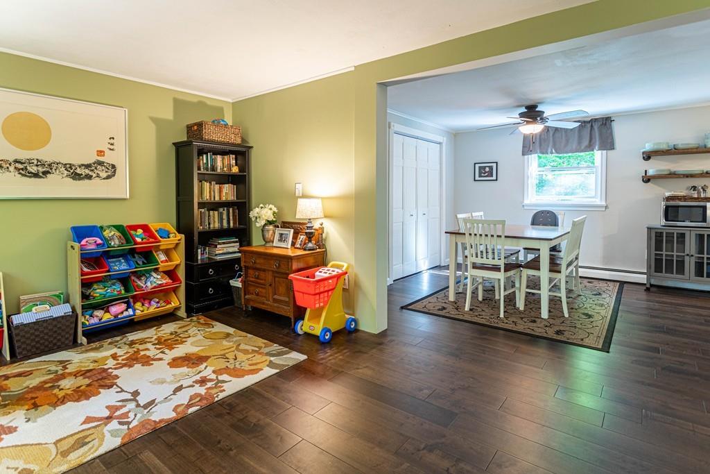 9 Holden Road Shirley, MA 01464 - Photo 11 of 42 a bedroom with furniture and a wooden floor