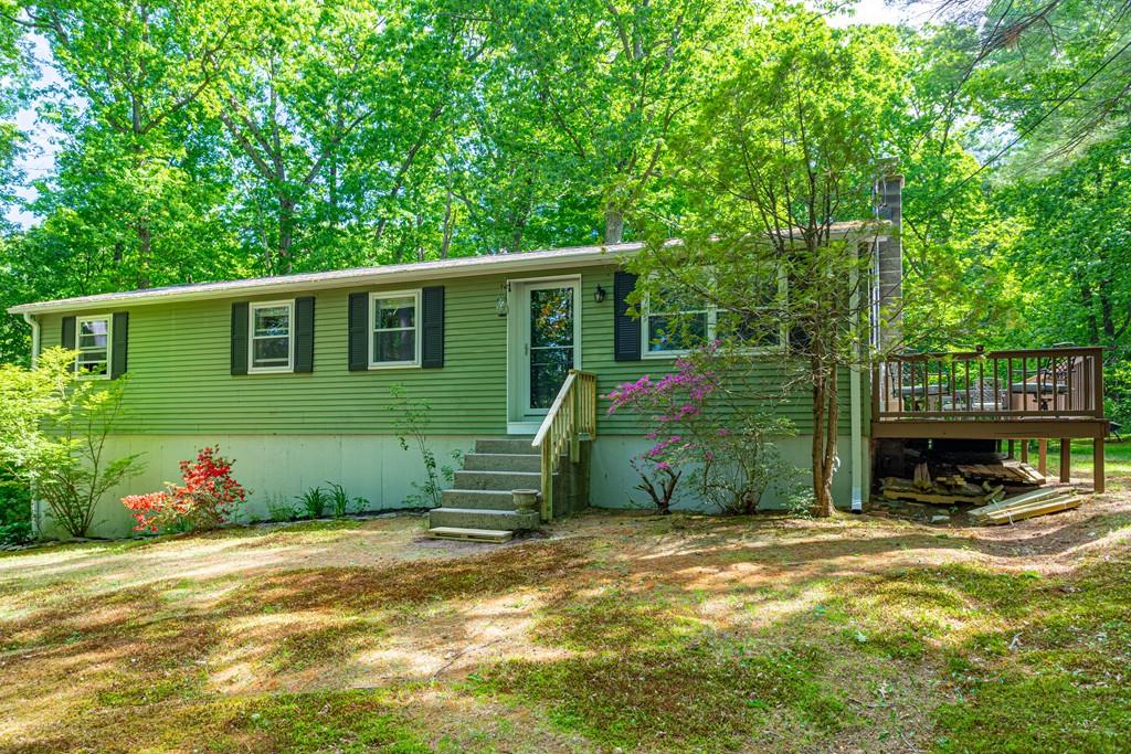 9 Holden Road Shirley, MA 01464 - Photo 2 of 42 a view of a house with backyard and sitting area