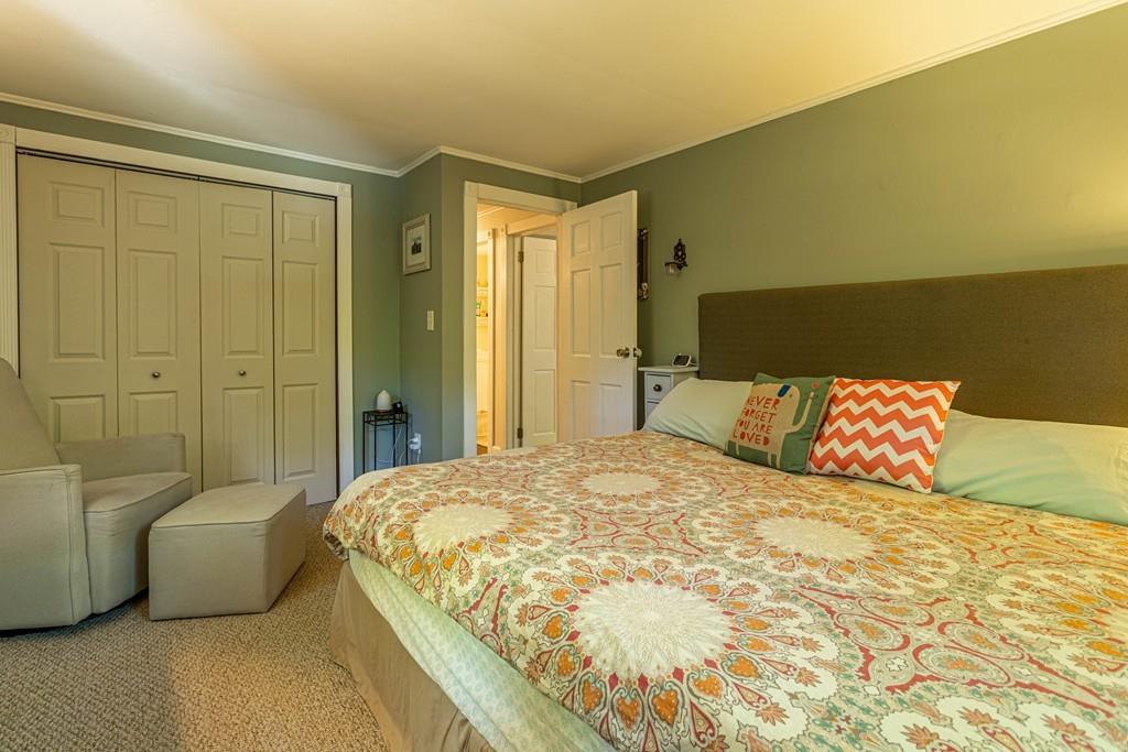 9 Holden Road Shirley, MA 01464 - Photo 23 of 42 a bedroom with a bed and a couch