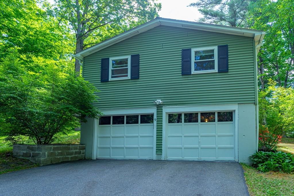 9 Holden Road Shirley, MA 01464 - Photo 3 of 42 a front view of a house with a garden