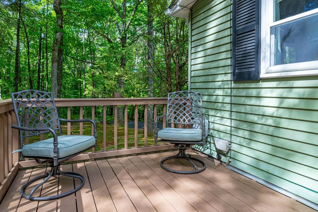 9 Holden Road Shirley, MA 01464 - Photo 40 of 42 a view of a chairs in wooden deck
