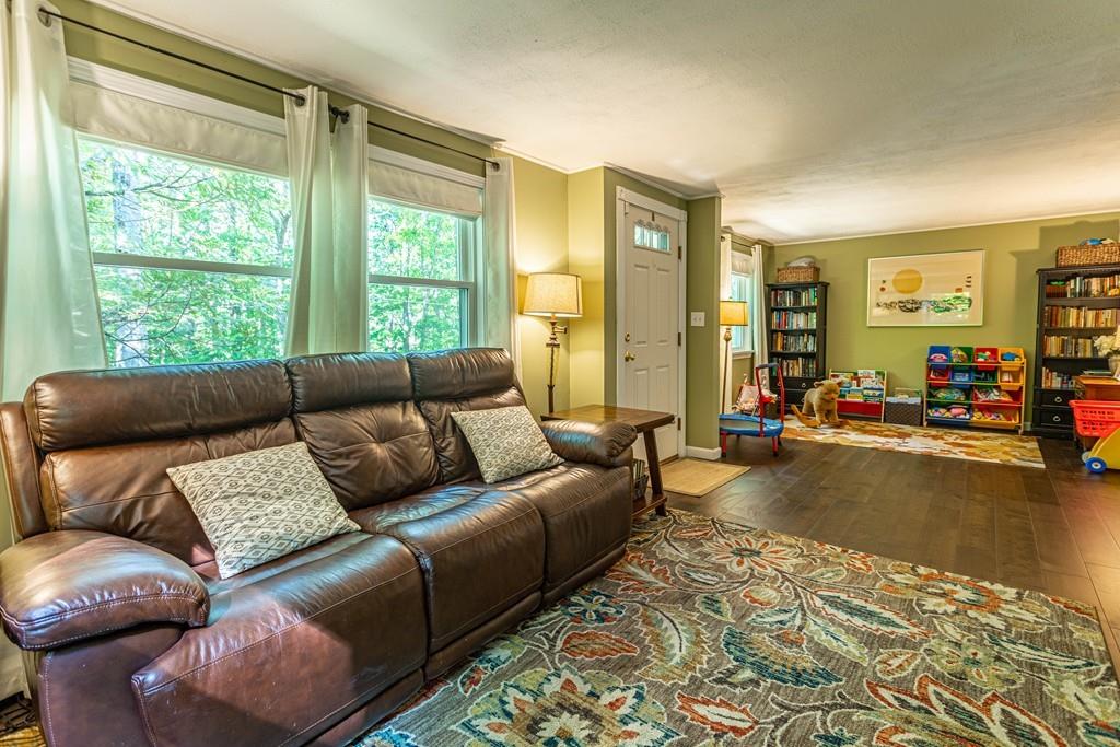 9 Holden Road Shirley, MA 01464 - Photo 6 of 42 a living room with furniture and a large window