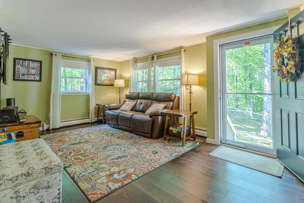 9 Holden Road Shirley, MA 01464 - Photo 8 of 42 a living room with furniture rug and window