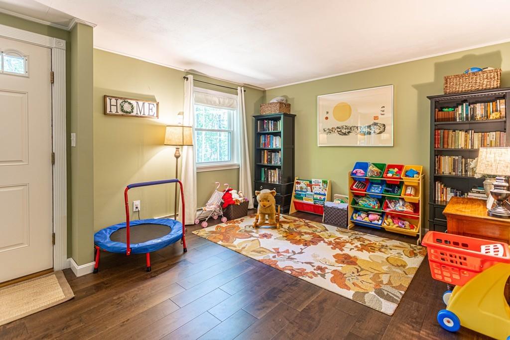 9 Holden Road Shirley, MA 01464 - Photo 10 of 42 a living room with lots of furniture and a wooden floor