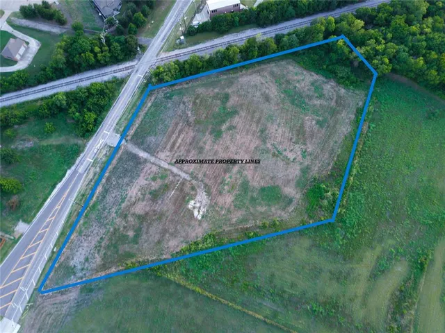 a view of a backyard with a garden