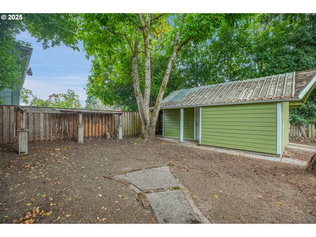 a view of front of a house with a small yard