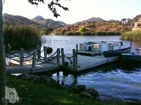 212 Dirt Road Lake Sherwood, CA 91361 - Photo 11 of 41 a view of a terrace with a garden
