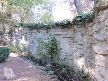 212 Dirt Road Lake Sherwood, CA 91361 - Photo 17 of 41 a backyard of a house with lots of green space