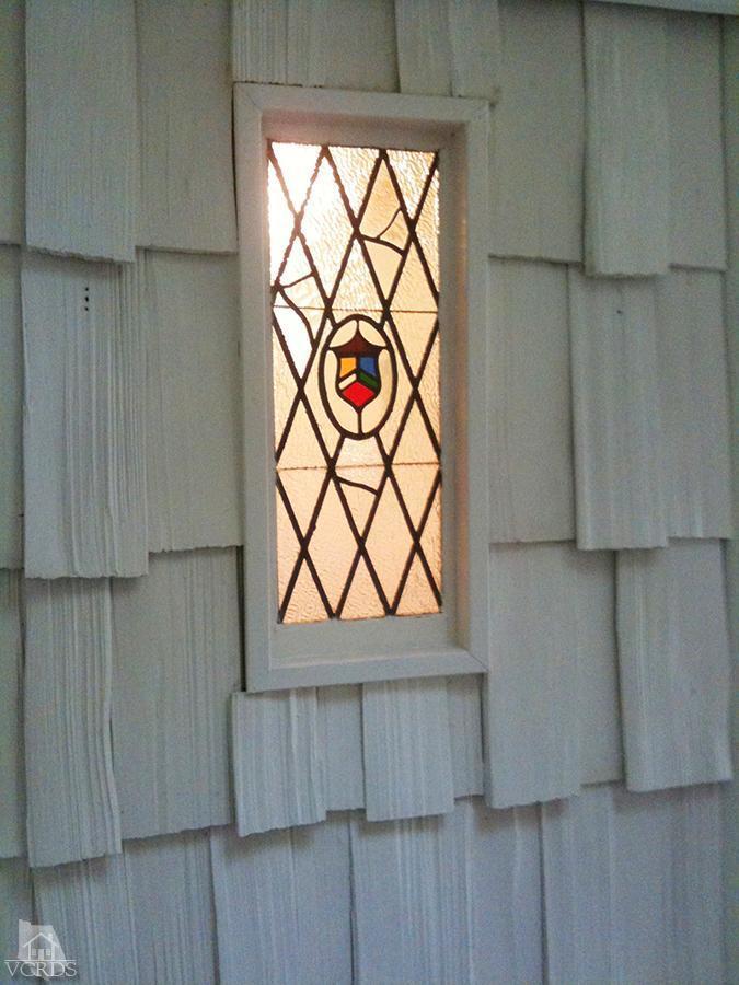 212 Dirt Road Lake Sherwood, CA 91361 - Photo 23 of 41 a view of a wooden door and a window in an oven