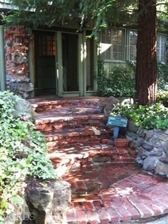 212 Dirt Road Lake Sherwood, CA 91361 - Photo 25 of 41 a view of a house with a yard