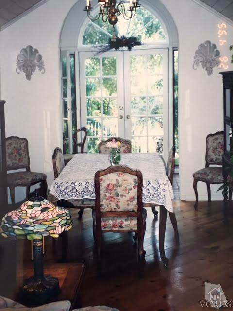 212 Dirt Road Lake Sherwood, CA 91361 - Photo 29 of 41 a view of a dining room with furniture window and wooden floor