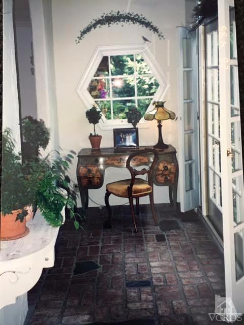 212 Dirt Road Lake Sherwood, CA 91361 - Photo 30 of 41 a view of a porch with furniture and yard