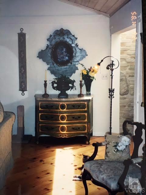 212 Dirt Road Lake Sherwood, CA 91361 - Photo 33 of 41 a living room with furniture and wooden floor