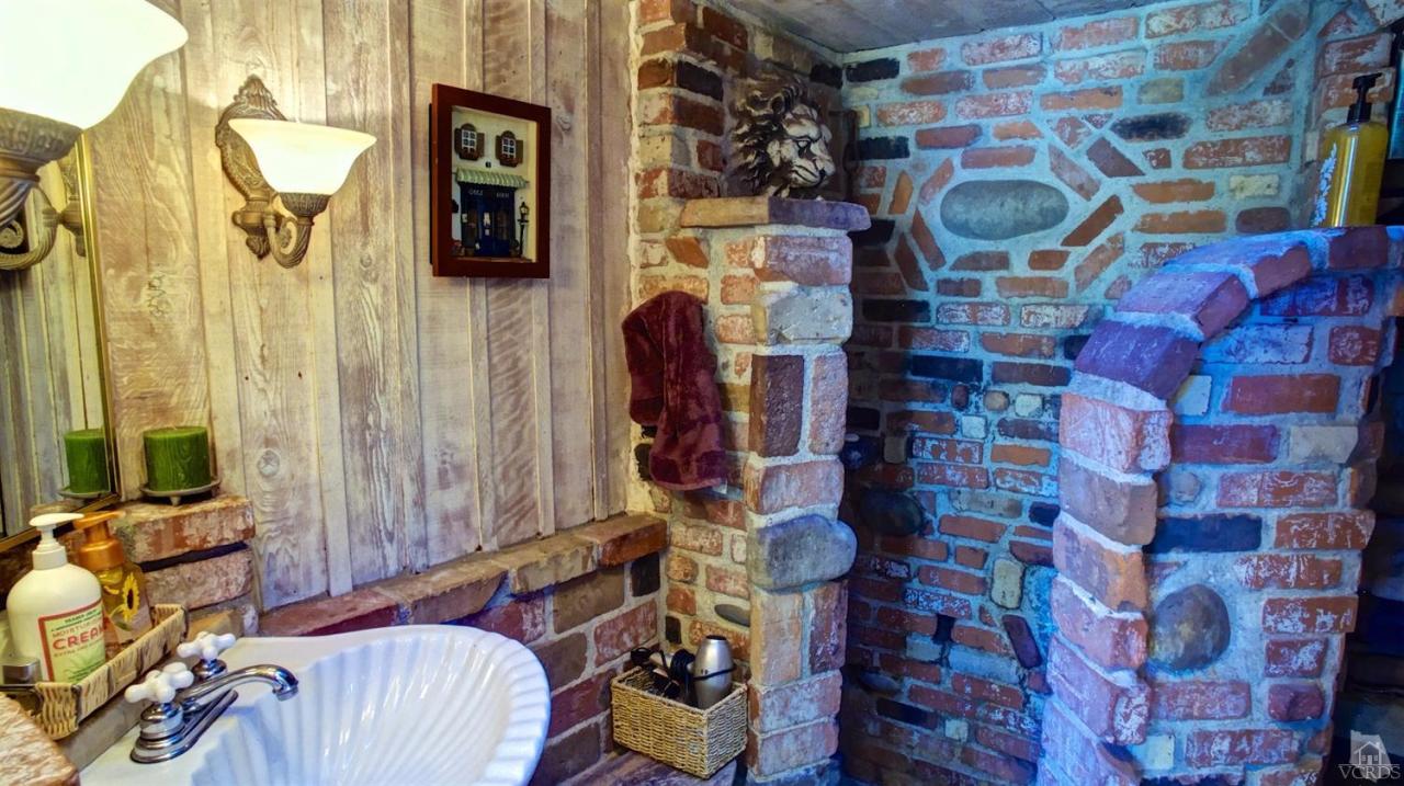 212 Dirt Road Lake Sherwood, CA 91361 - Photo 34 of 41 a room with furniture and garden view