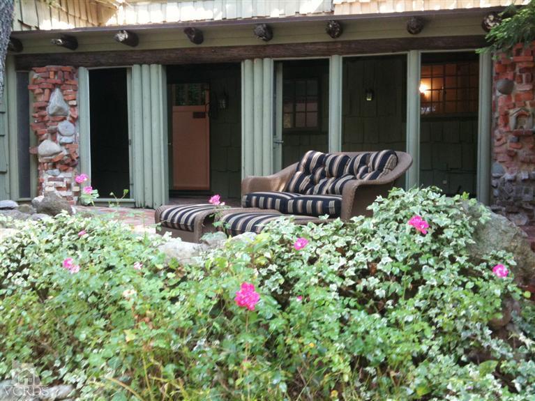 212 Dirt Road Lake Sherwood, CA 91361 - Photo 40 of 41 a view of a house that has a flower garden