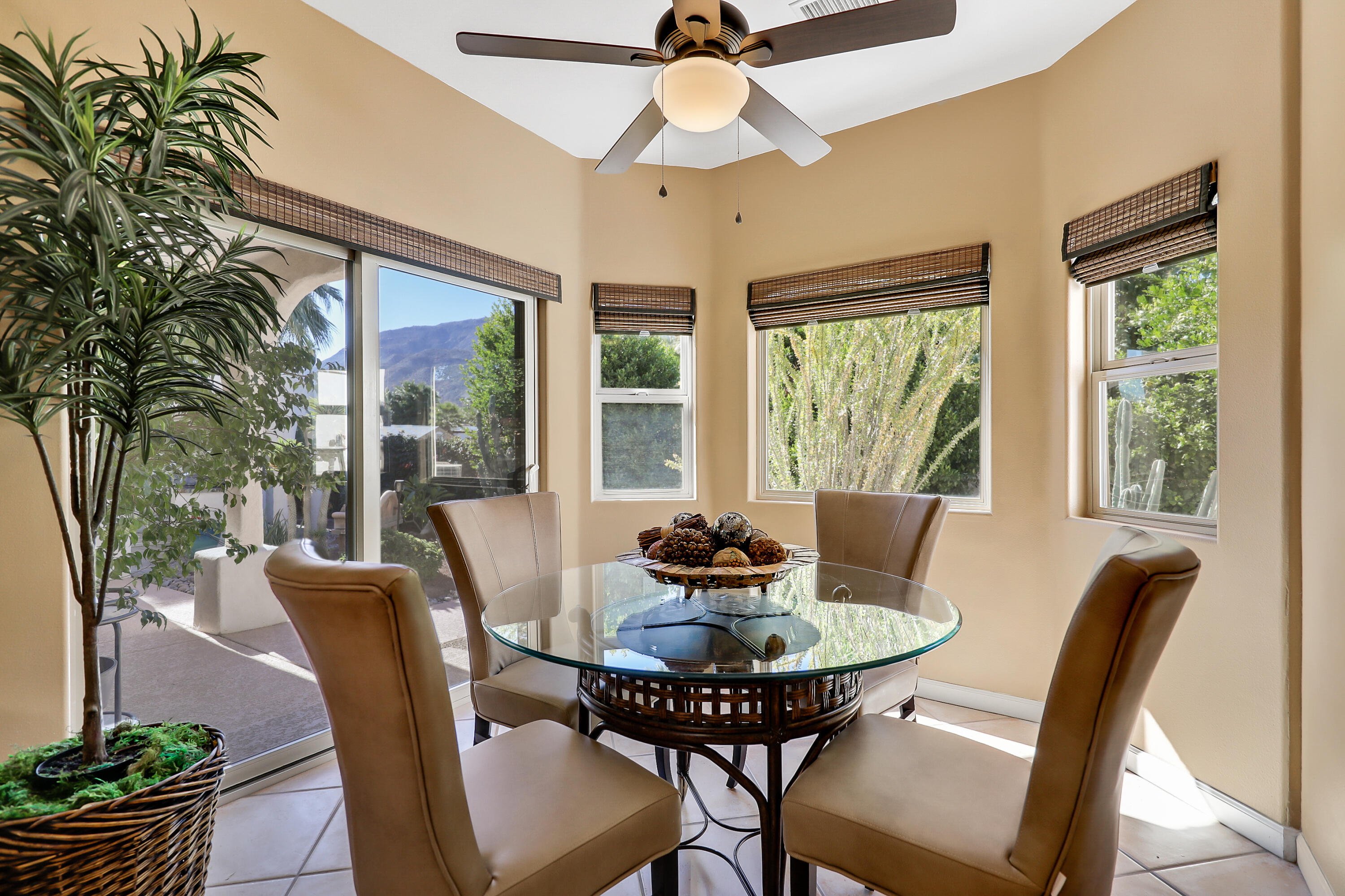 72447 Magnesia Falls Drive Rancho Mirage, CA 92270 - Photo 19 of 50 a view of a dining room with furniture window and outside view