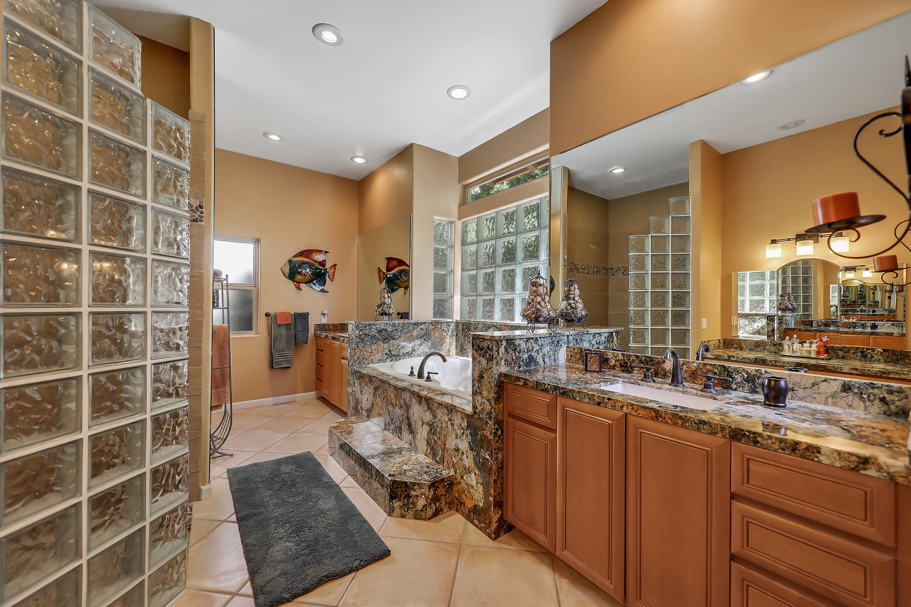 72447 Magnesia Falls Drive Rancho Mirage, CA 92270 - Photo 23 of 50 a large room with a large window and a sink