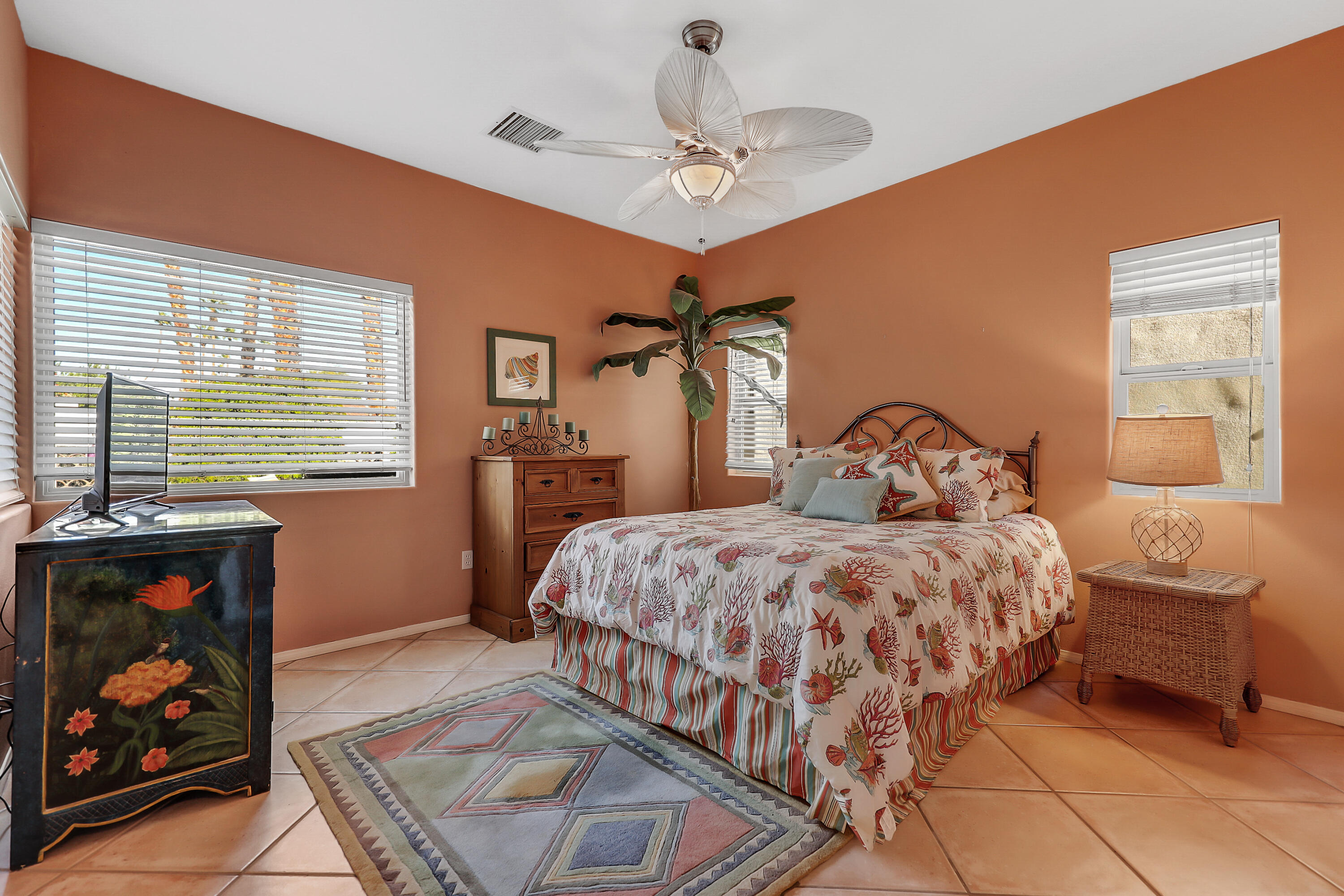 72447 Magnesia Falls Drive Rancho Mirage, CA 92270 - Photo 26 of 50 a bedroom with a bed and window