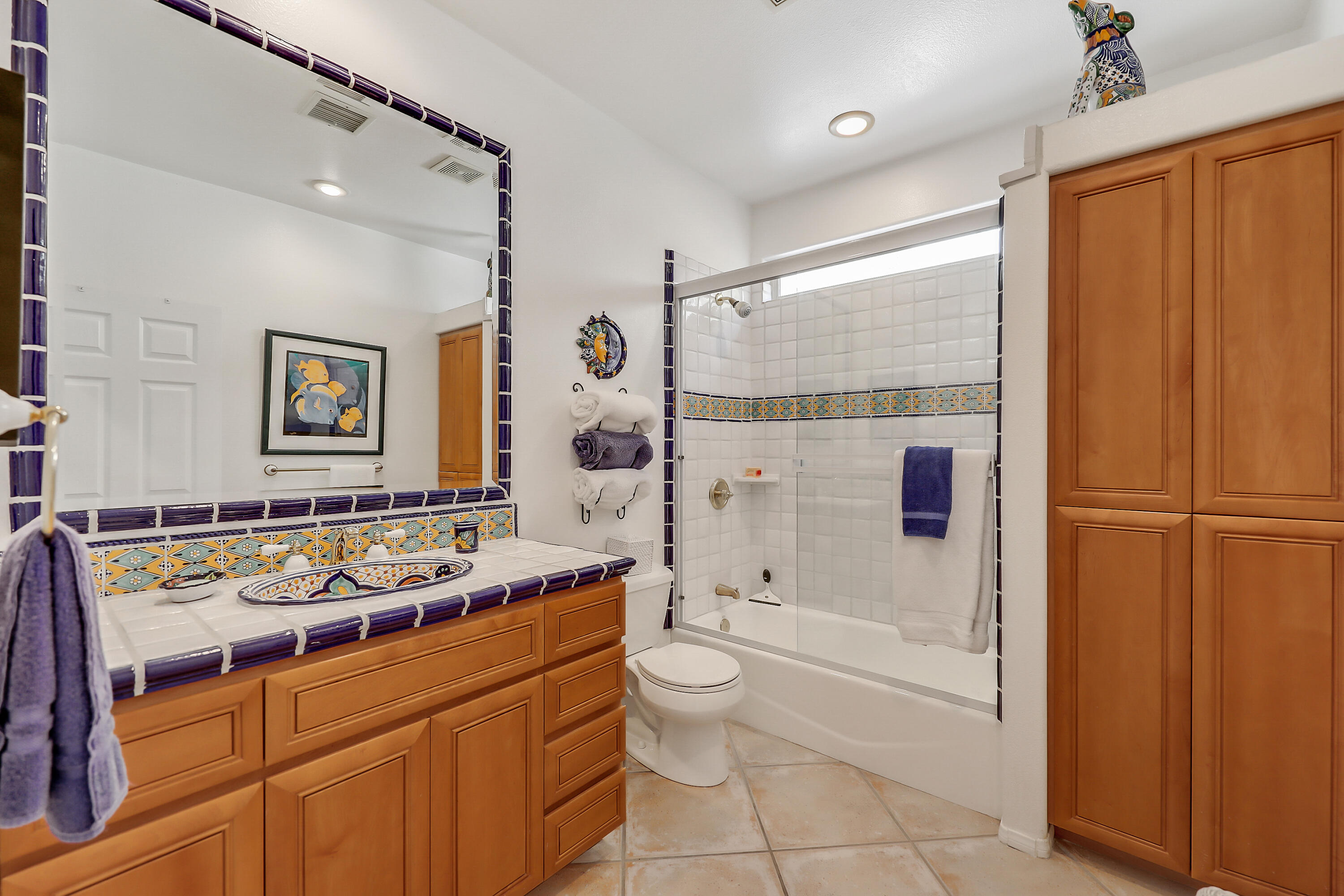 72447 Magnesia Falls Drive Rancho Mirage, CA 92270 - Photo 27 of 50 a bathroom with a sink toilet tub and shower