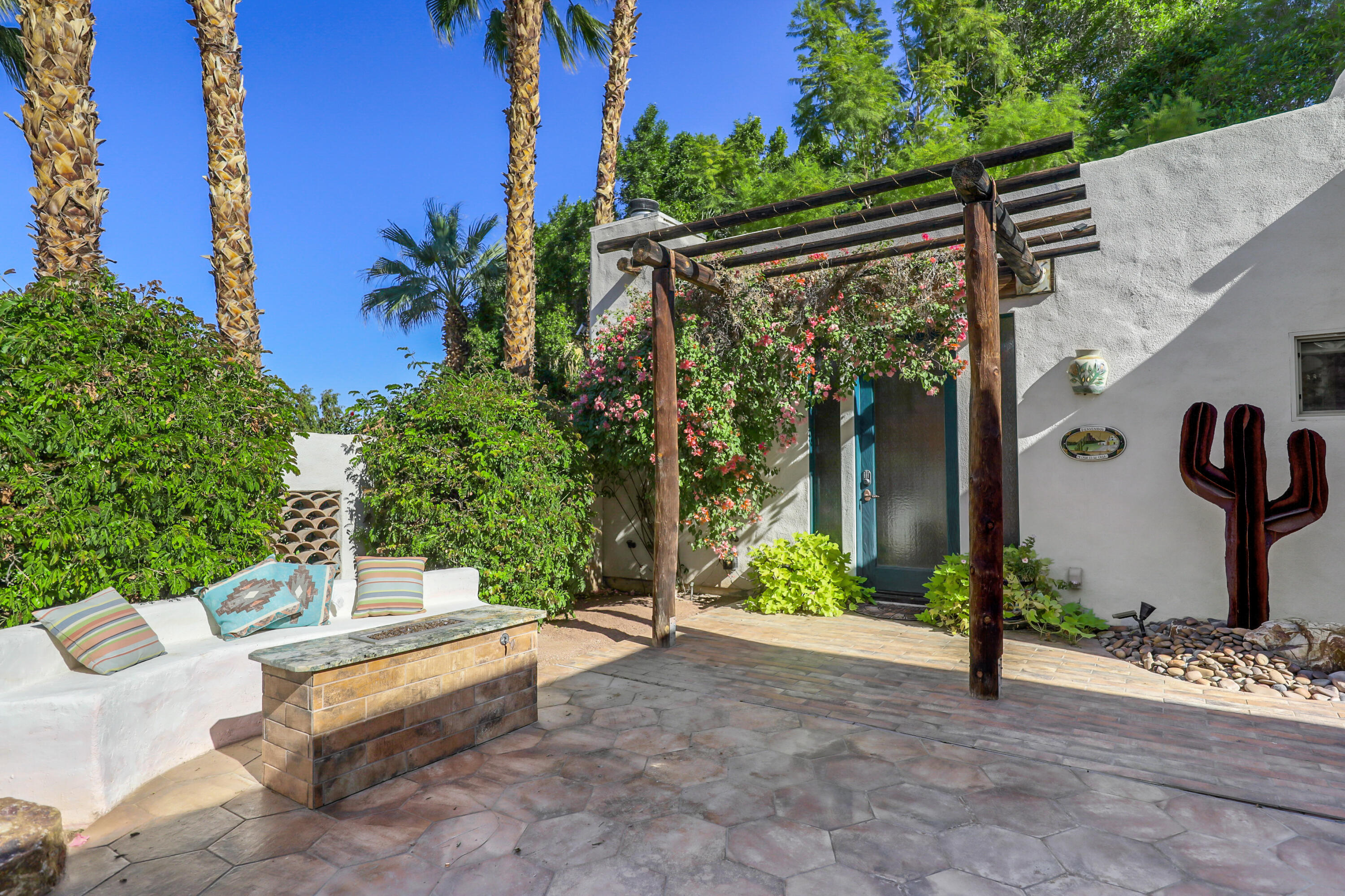 72447 Magnesia Falls Drive Rancho Mirage, CA 92270 - Photo 29 of 50 a view of a back yard of the house