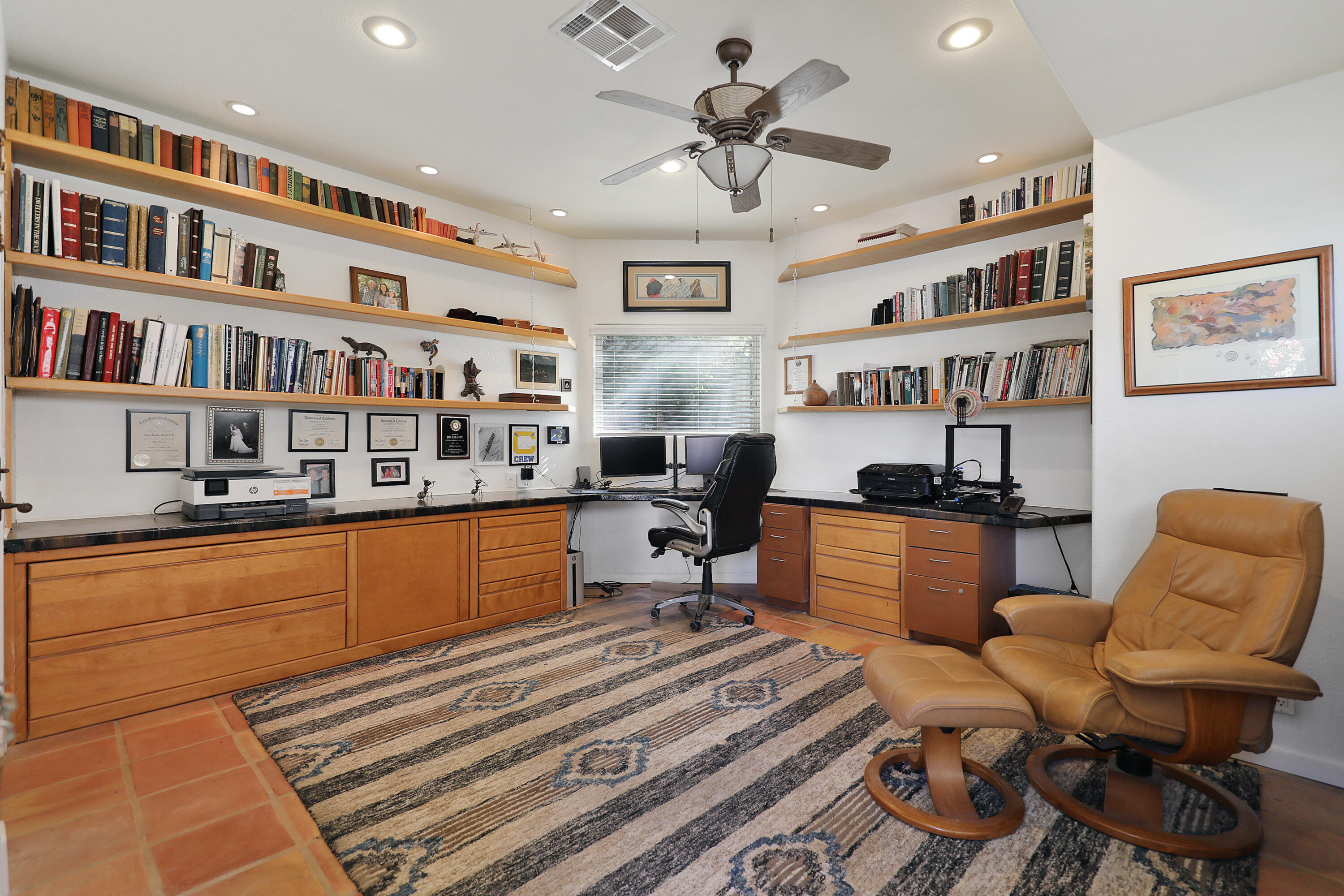 72447 Magnesia Falls Drive Rancho Mirage, CA 92270 - Photo 33 of 50 a living room with furniture cabinets and window