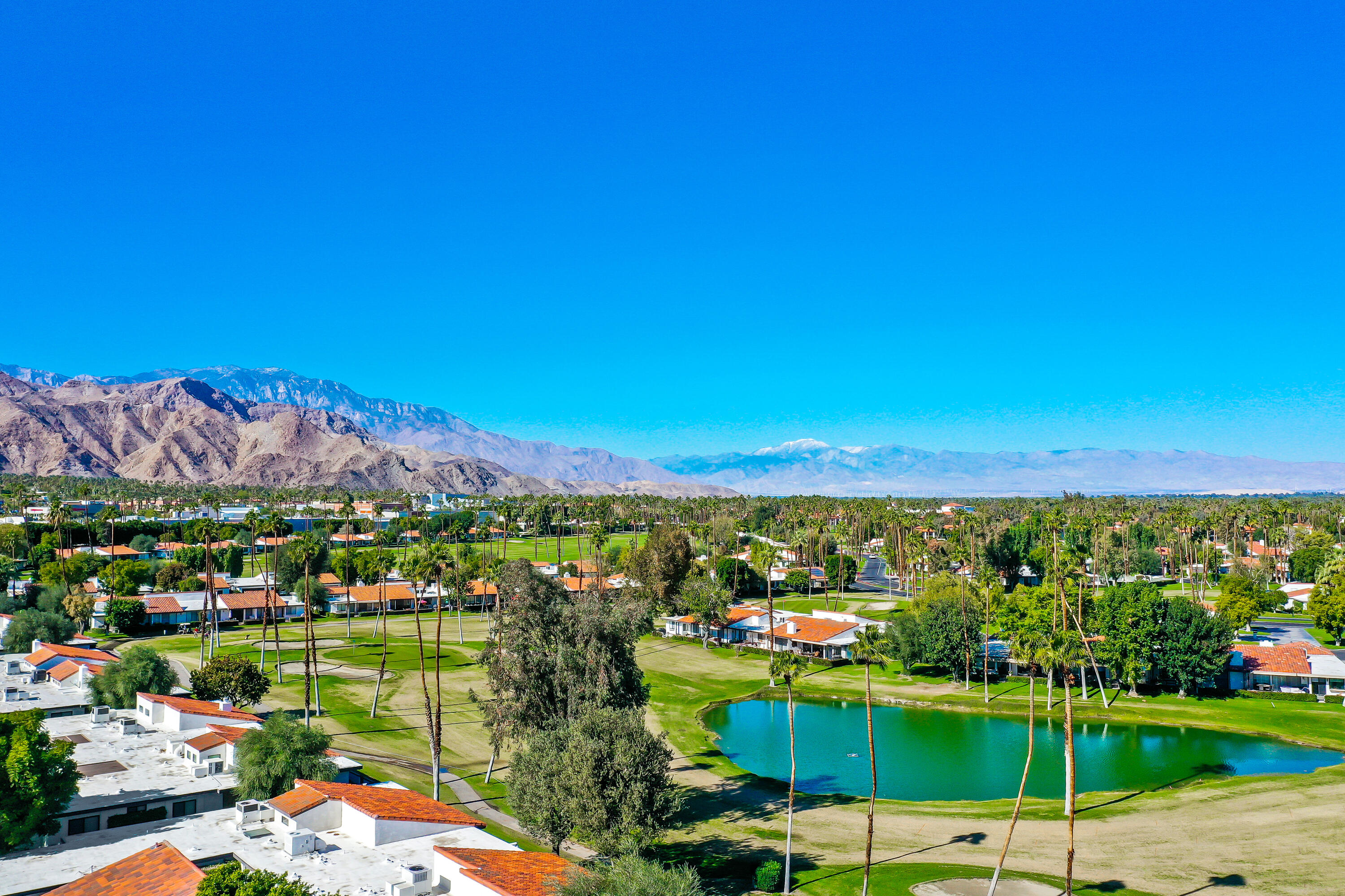 72447 Magnesia Falls Drive Rancho Mirage, CA 92270 - Photo 49 of 50 a view of a city with a lake view