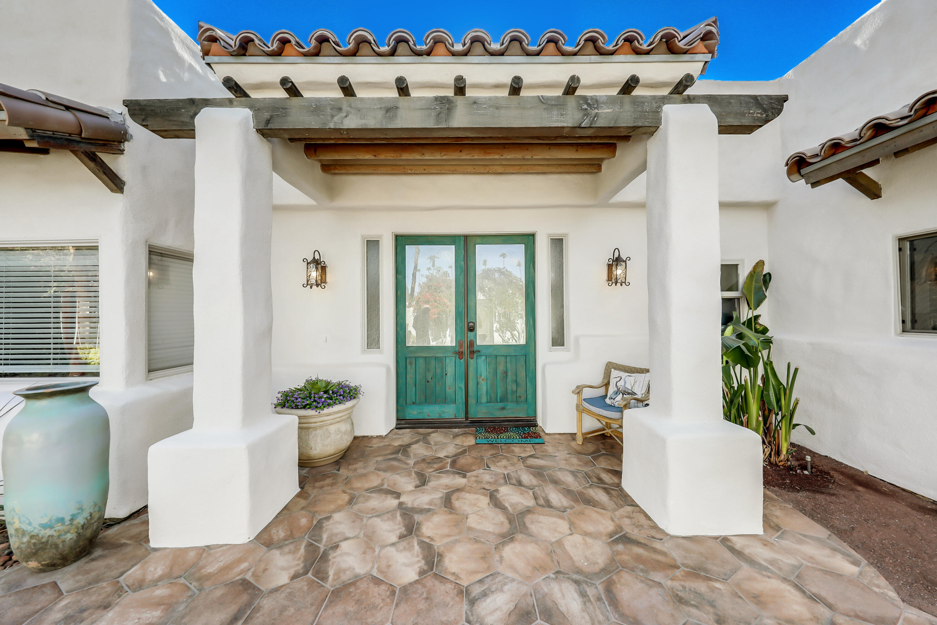 72447 Magnesia Falls Drive Rancho Mirage, CA 92270 - Photo 5 of 50 a view of a entryway of the house