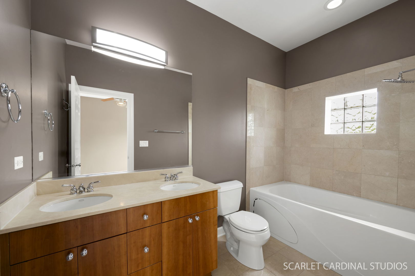 1419 West Fillmore Street, Unit 3W Chicago, IL 60607 - Photo 20 of 26 a bathroom with a sink a toilet a tub and shower
