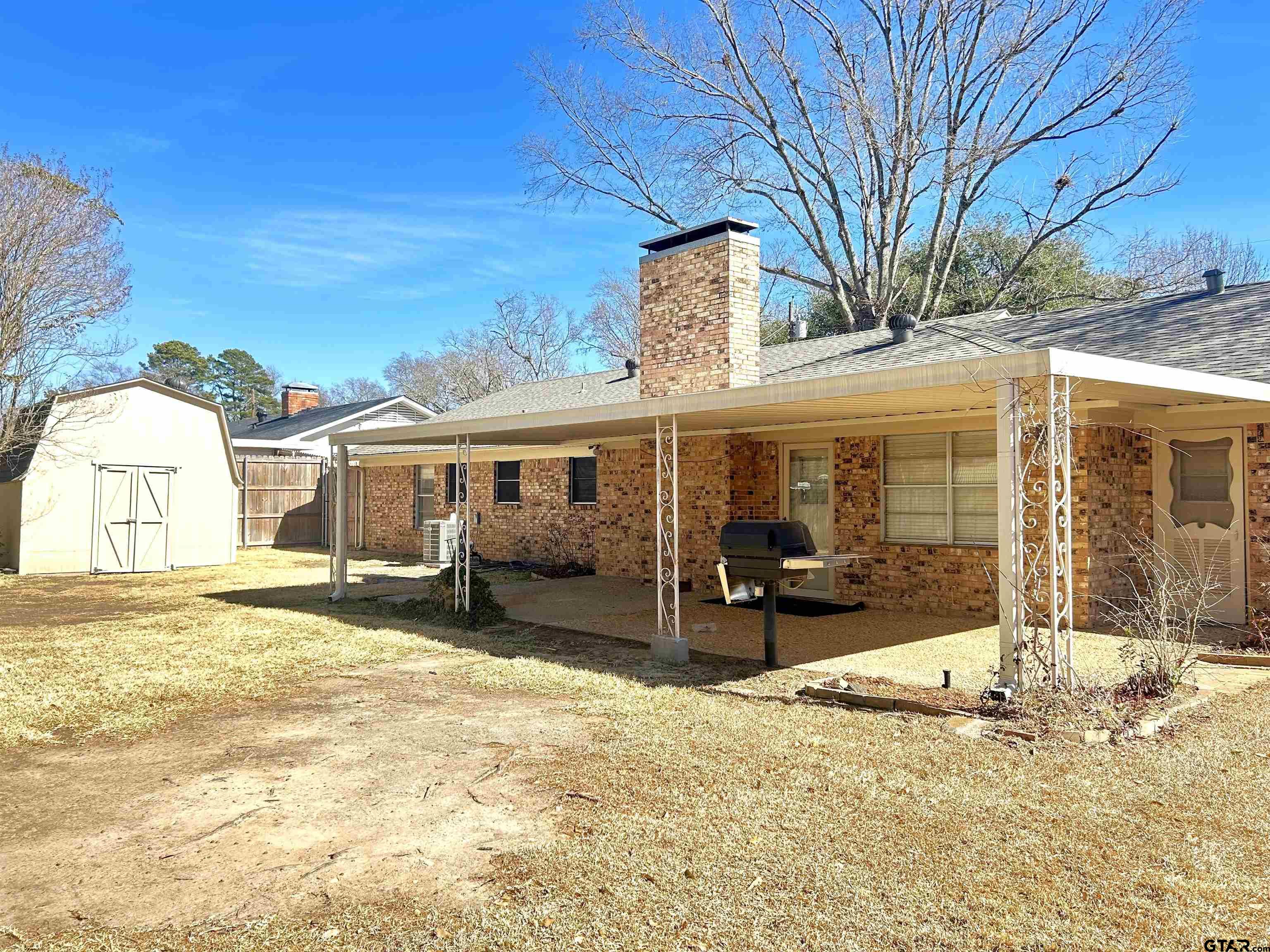 3713 Colgate Avenue Tyler, TX 75701 - Photo 12 of 13 a front view of a house with a patio