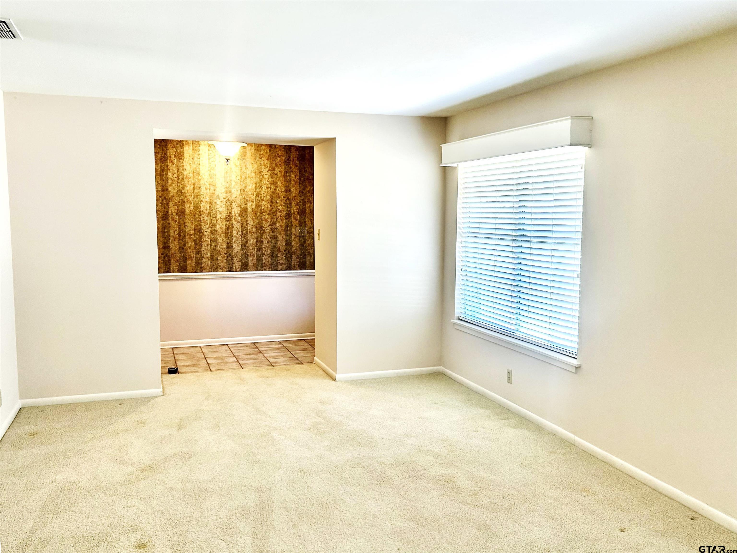 3713 Colgate Avenue Tyler, TX 75701 - Photo 8 of 13 a view of an empty room with a window