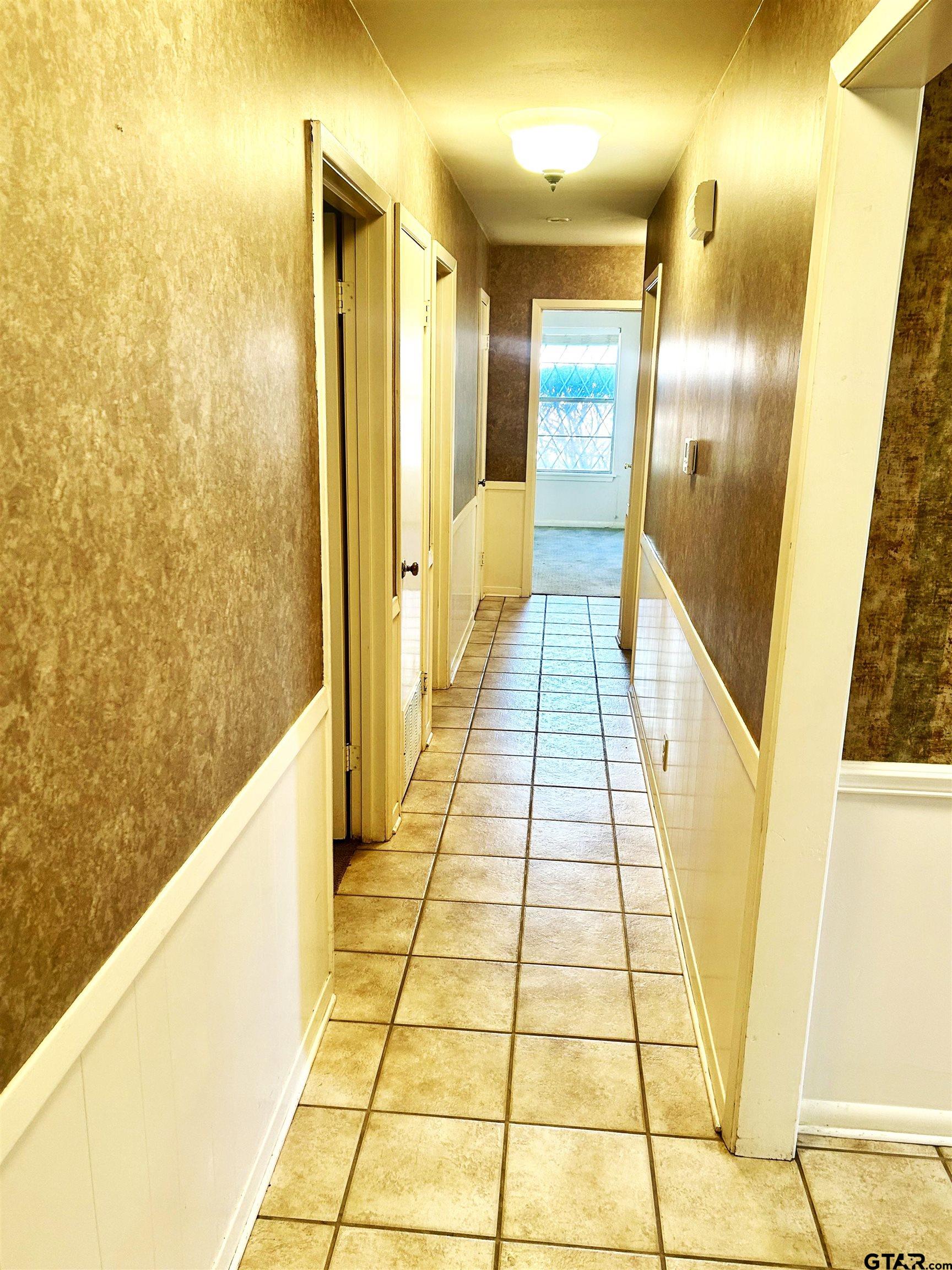3713 Colgate Avenue Tyler, TX 75701 - Photo 9 of 13 a view of a bathroom with shower