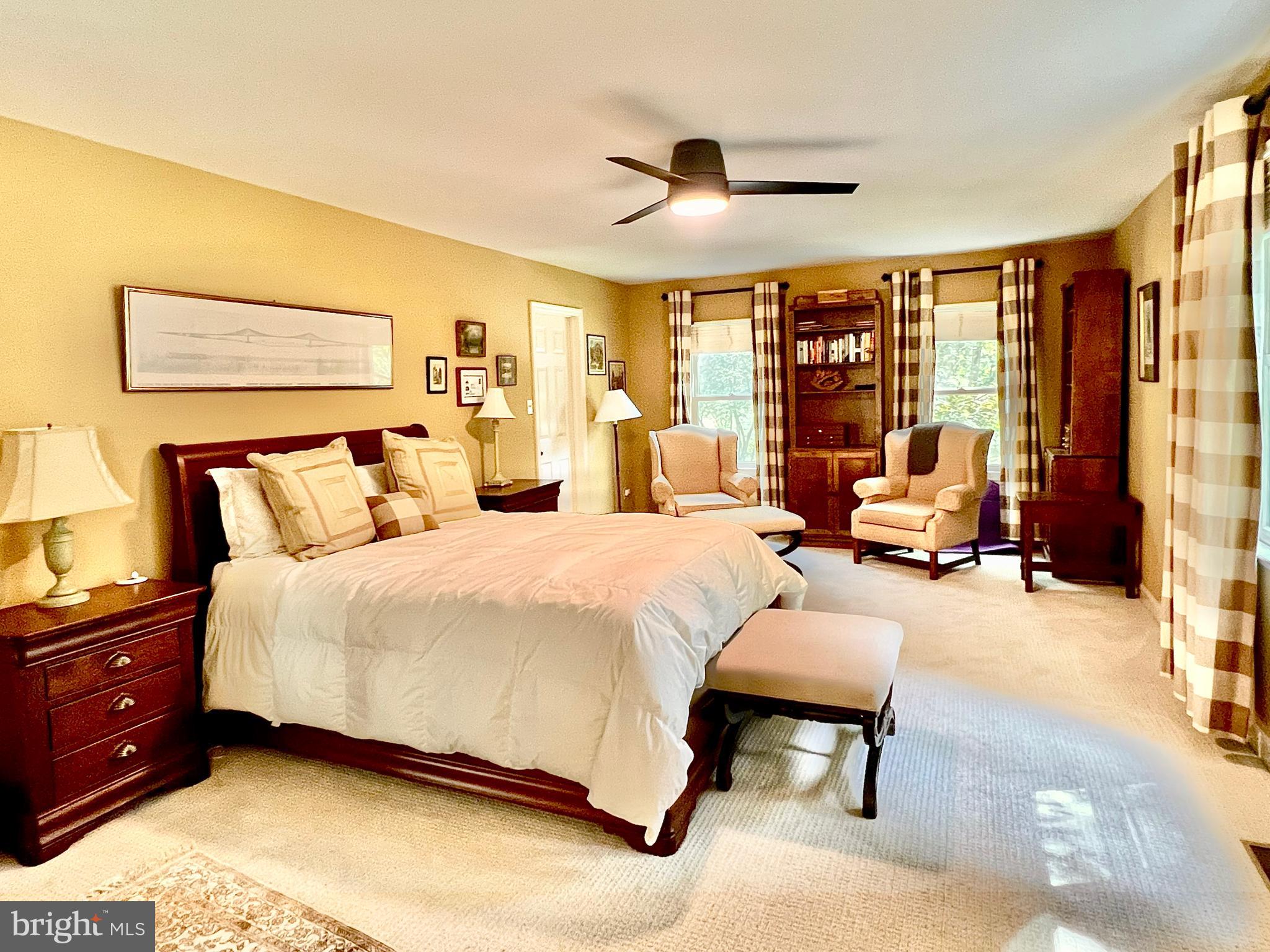 3 Royal Court Reading, PA 19607 - Photo 24 of 39 a spacious bedroom with a bed and large windows