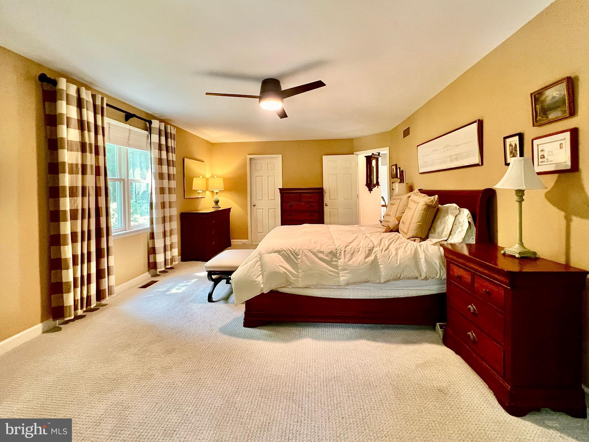3 Royal Court Reading, PA 19607 - Photo 25 of 39 a bedroom with a bed and wooden floor