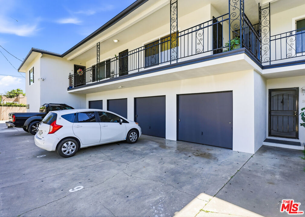 1027 North Parton Street Santa Ana, CA 92701 - Photo 6 of 7 a car parked in front of a building