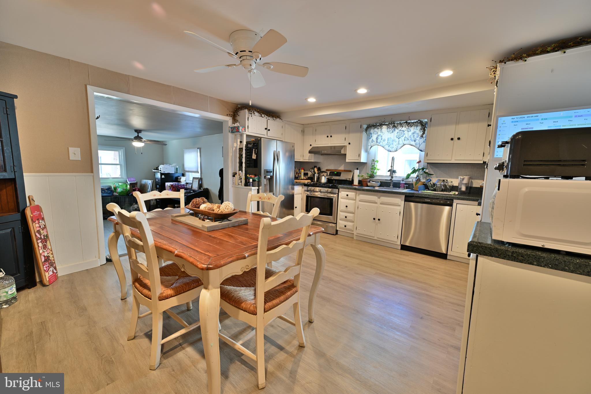 24734 East Main Street Columbus, NJ 08022 - Photo 2 of 24 a view of a dining room with furniture and a kitchen