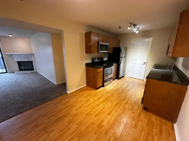 a bedroom with a bed and a television in it