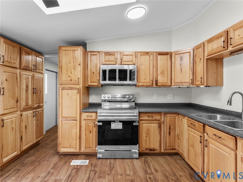 4772 Carsley Road Waverly, VA 23890 - Photo 7 of 38 Kitchen featuring appliances with stainless steel