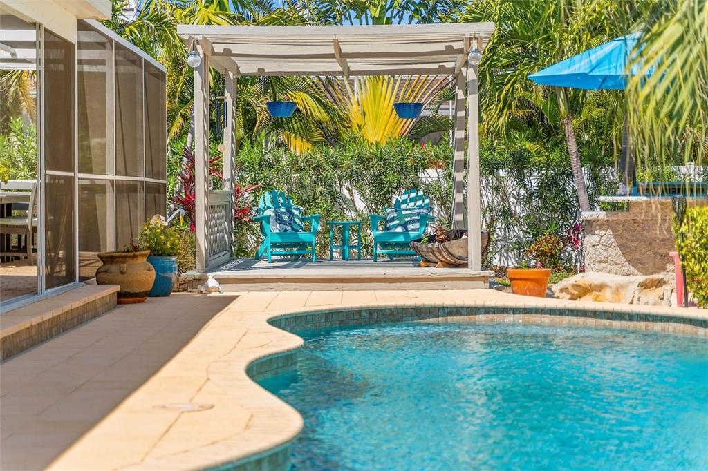 725 Monte Cristo Boulevard Tierra Verde, FL 33715 - Photo 8 of 63 a view of swimming pool with patio